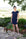 Model wearing navy Restless Lounger Dress with built-in shelf bra and relaxed bamboo silhouette