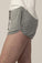 Side view of Hang Out Track Shorts in Heather Gray showing soft bamboo fabric and side pockets.