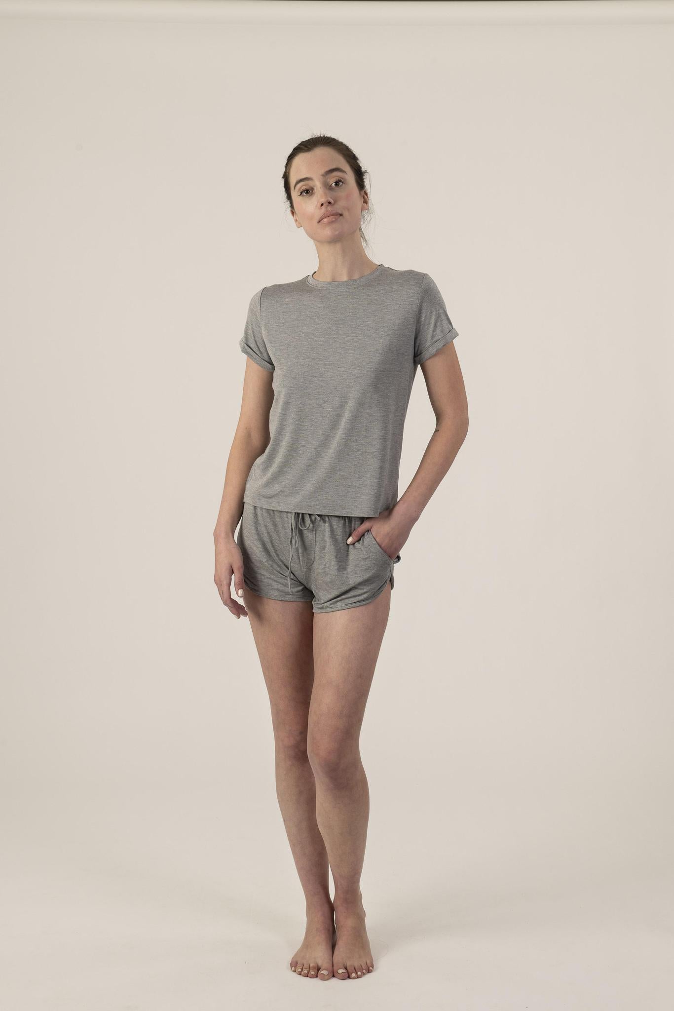 Model wearing Hang Out Track Shorts in Heather Gray with relaxed fit and drawstring waistband, with matching t-shirt